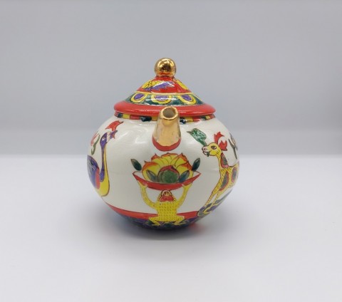 Tea set, in overglaze enamels with peach and flower motifs