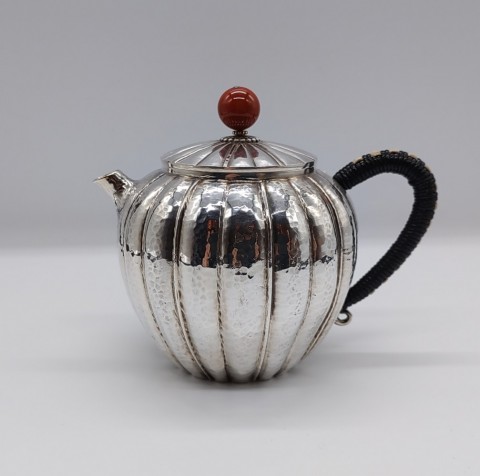 Sterling silver teapot with red round jeweled lid