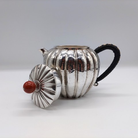 Sterling silver teapot with red round jeweled lid